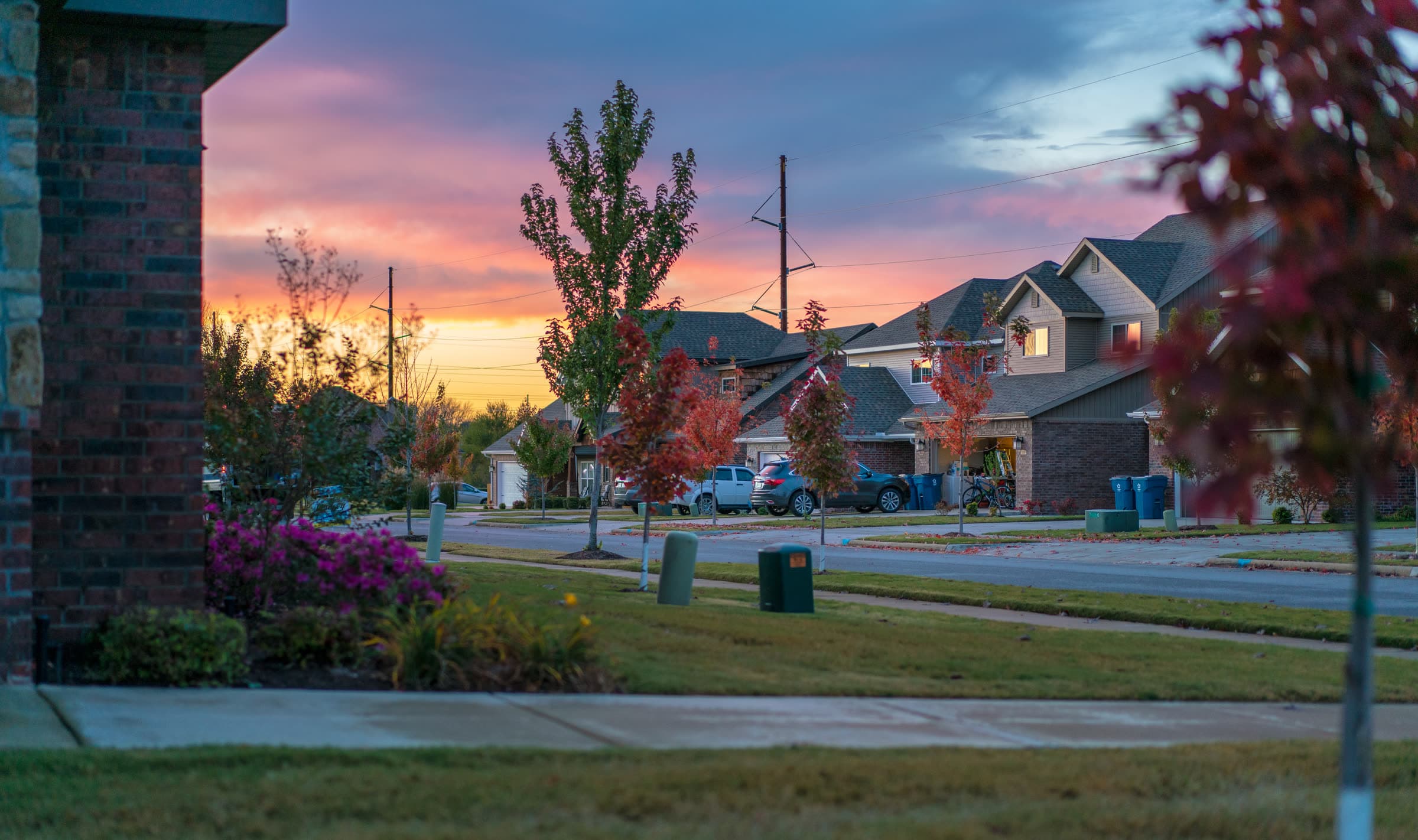 Homes in a Northwest Arkansas neighborhood at sunset